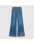 [GUCCI] Washed denim flare trousers with Gucci label 623441XDA6N4759
